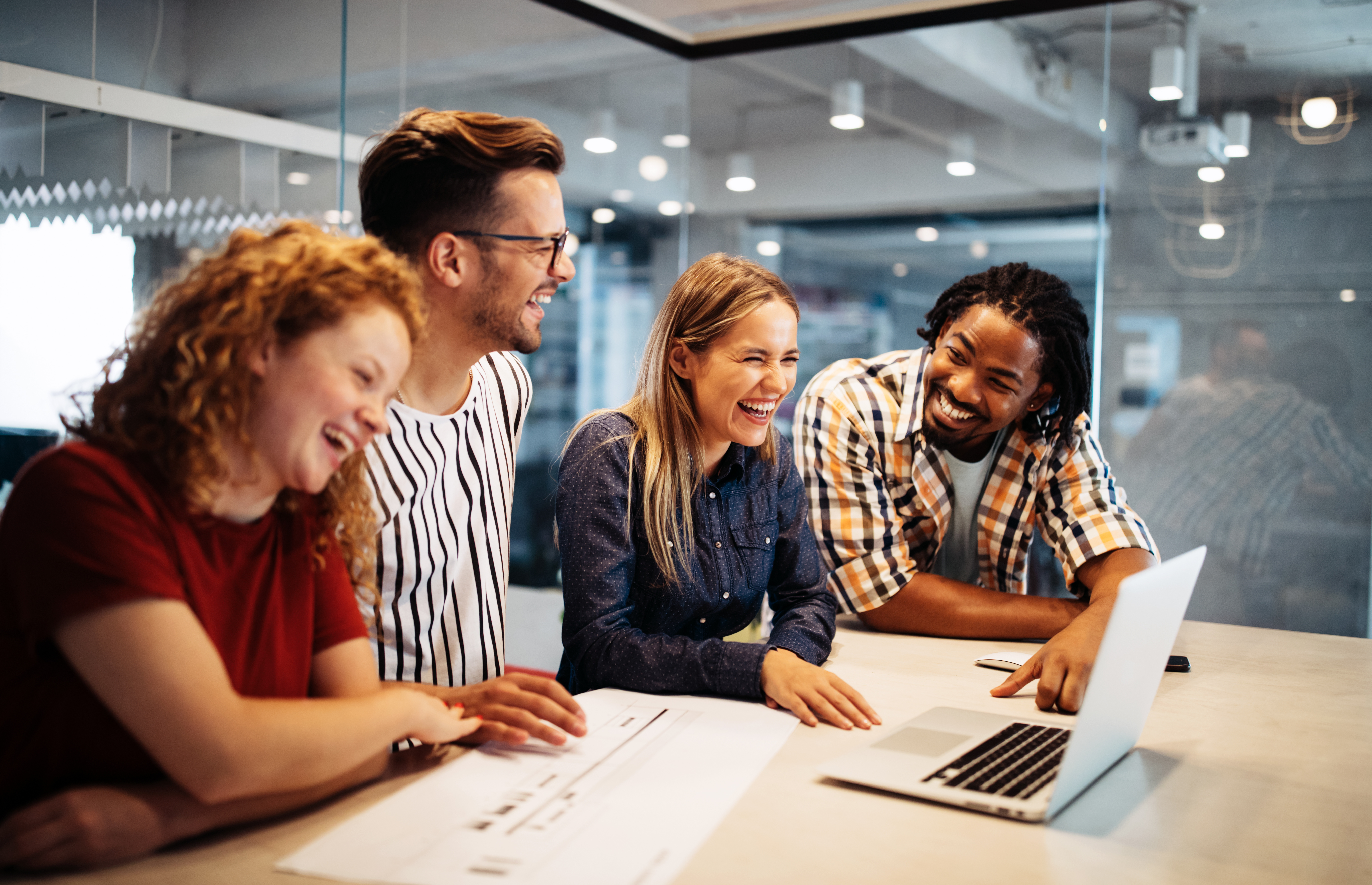 Happy creative designers, business people brainstorming in office
