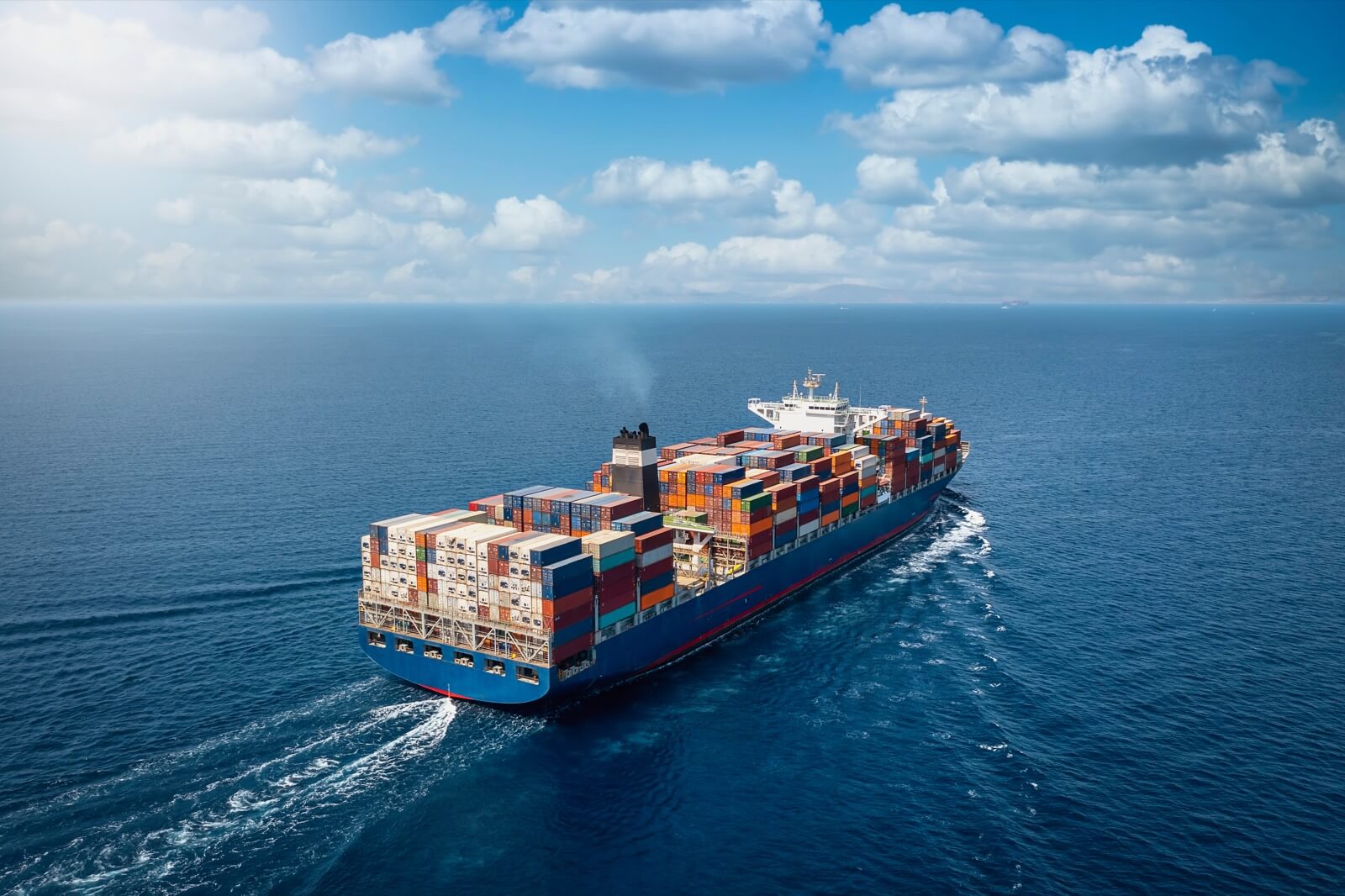 Large container cargo ship carrying export goods across the ocean